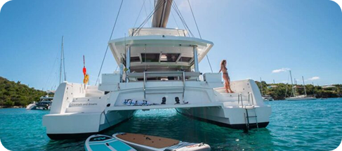 Catamaran moored in a calm sunny marina